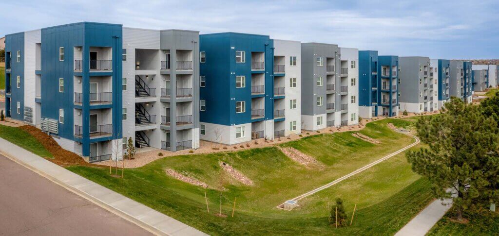 right side paint grey blue white apartments alpine vista