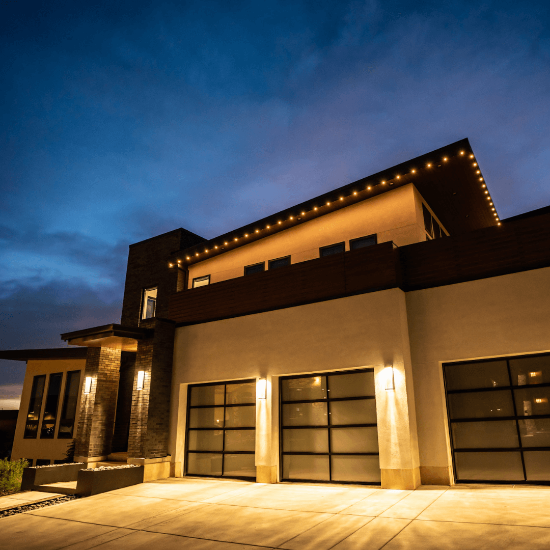 A home with exterior soffit lighting illustrates the benefits of illumination for curb appeal. 